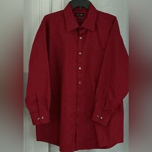 Axcess brand men's button-down shirt made with a "no iron" feature